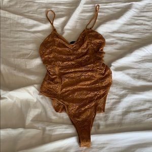 Mustard colored body suit